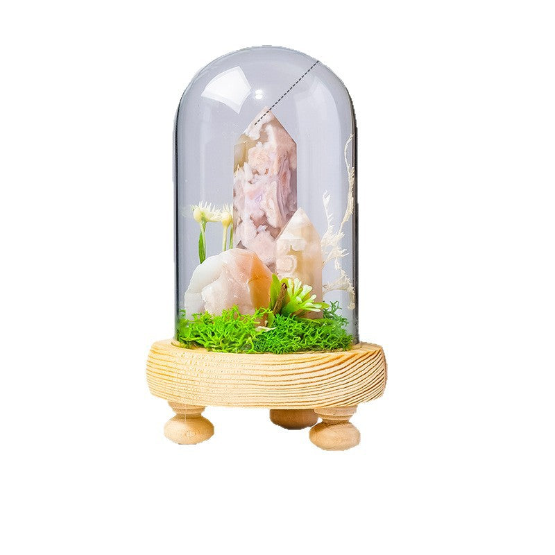 Crystal Dome — a raw crystal standing in preserved moss on a turned wood base, under a glass dome