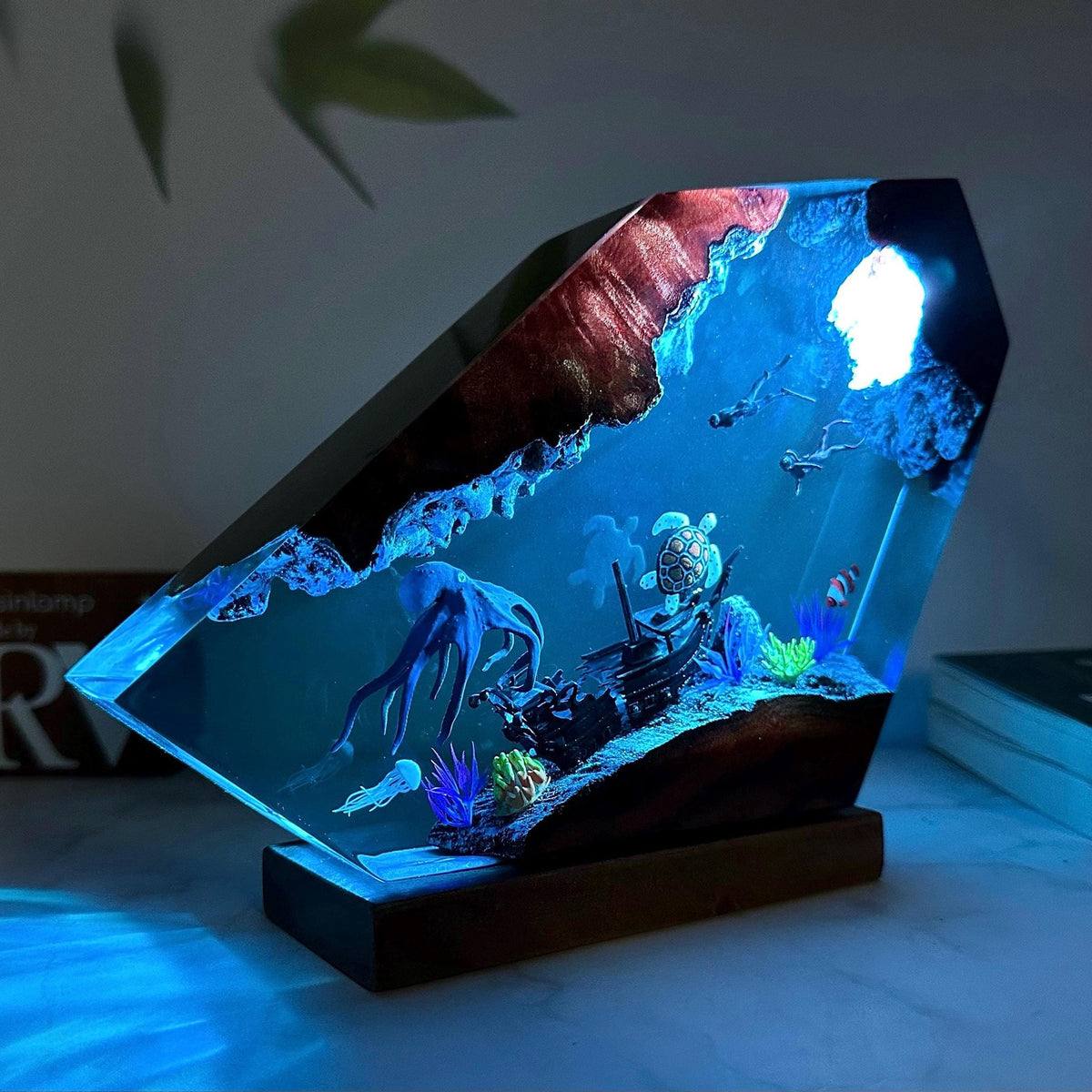Octopus Lamp — an octopus cast in epoxy resin over a solid wood base, lit from underneath