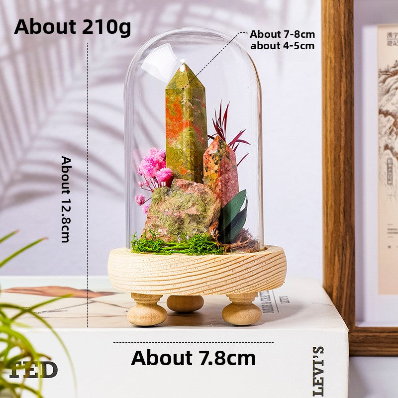 Crystal Dome — a raw crystal standing in preserved moss on a turned wood base, under a glass dome