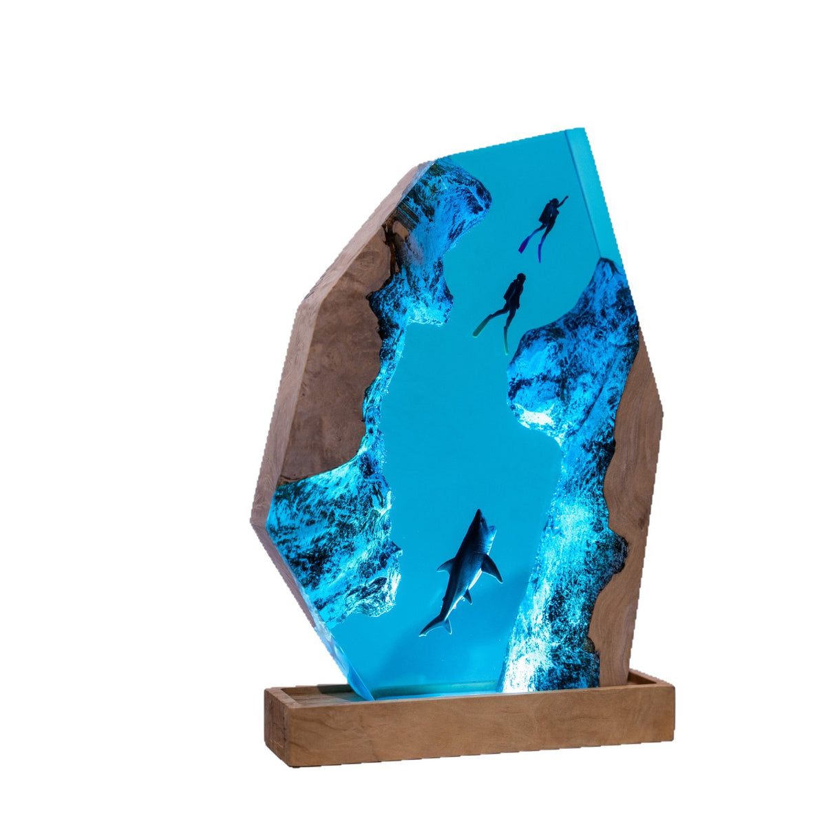 Diver Lamp — two divers and a shark in open blue water, cast in resin between two pieces of wood