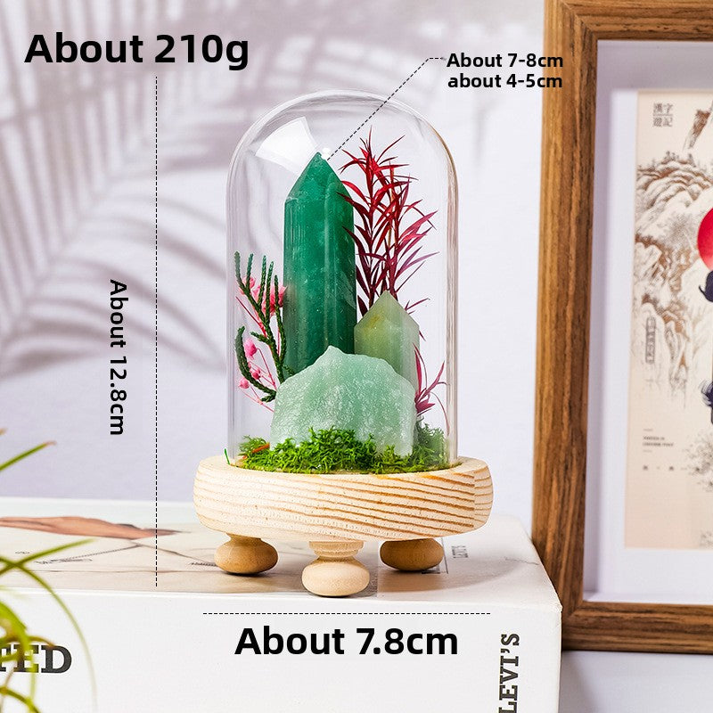 Crystal Dome — a raw crystal standing in preserved moss on a turned wood base, under a glass dome