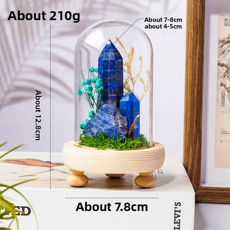 Crystal Dome — a raw crystal standing in preserved moss on a turned wood base, under a glass dome