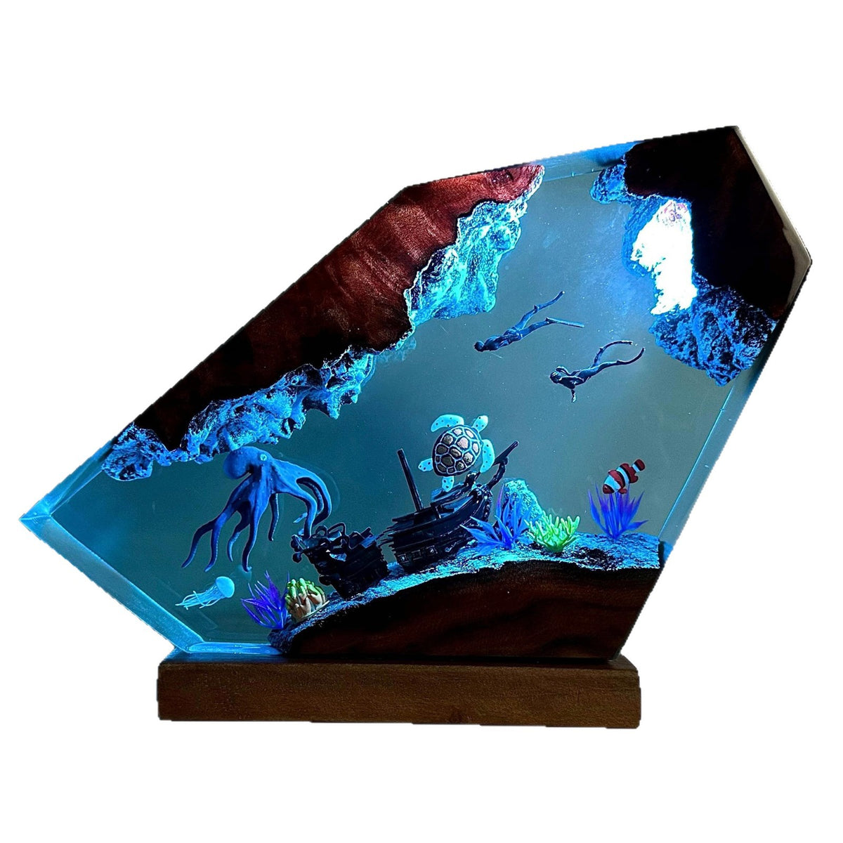 Octopus Lamp — an octopus cast in epoxy resin over a solid wood base, lit from underneath