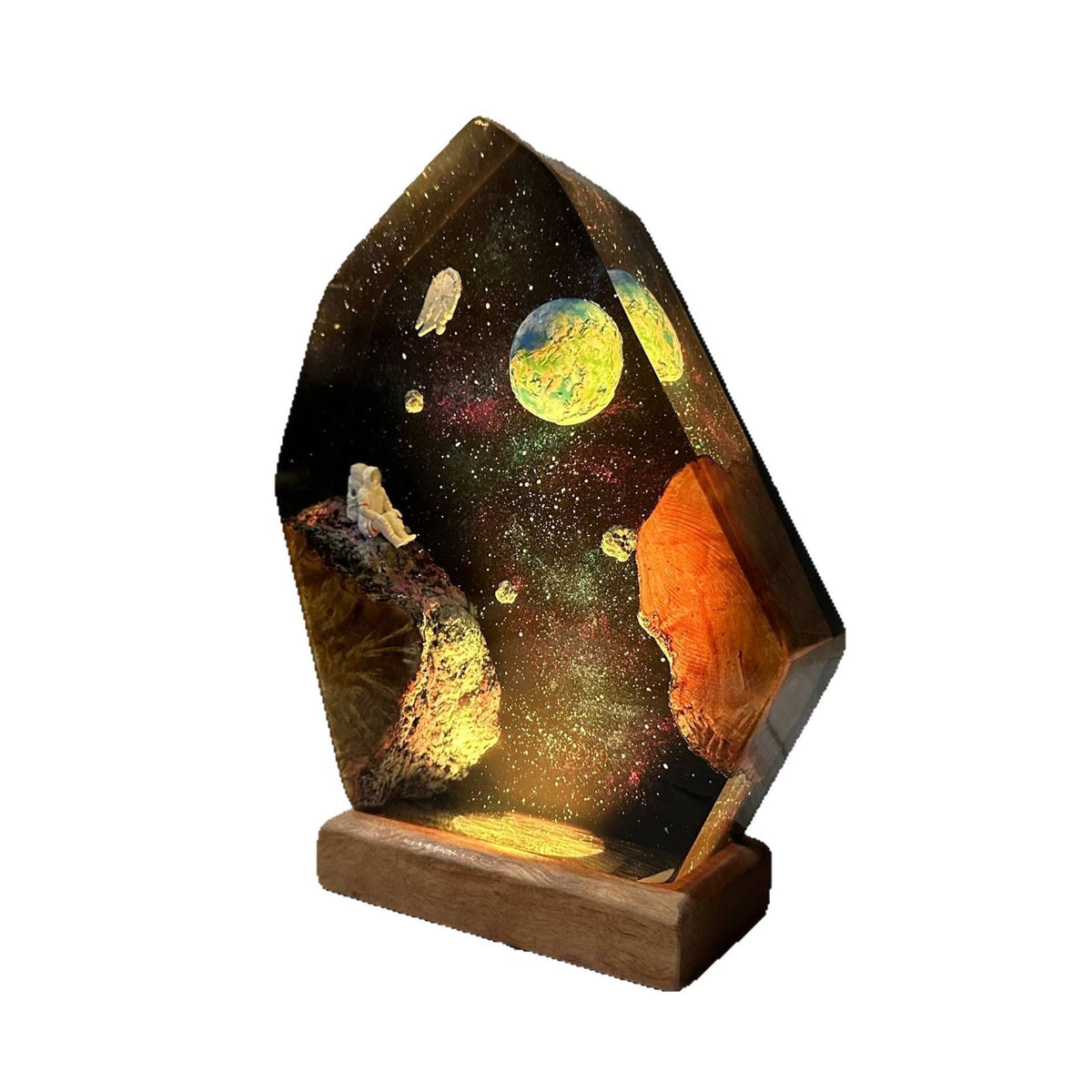 Earthrise Lamp — the Earth rising over a resin galaxy on a wood base, lit from below