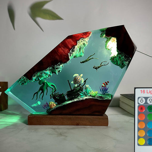 Octopus Lamp — an octopus cast in epoxy resin over a solid wood base, lit from underneath