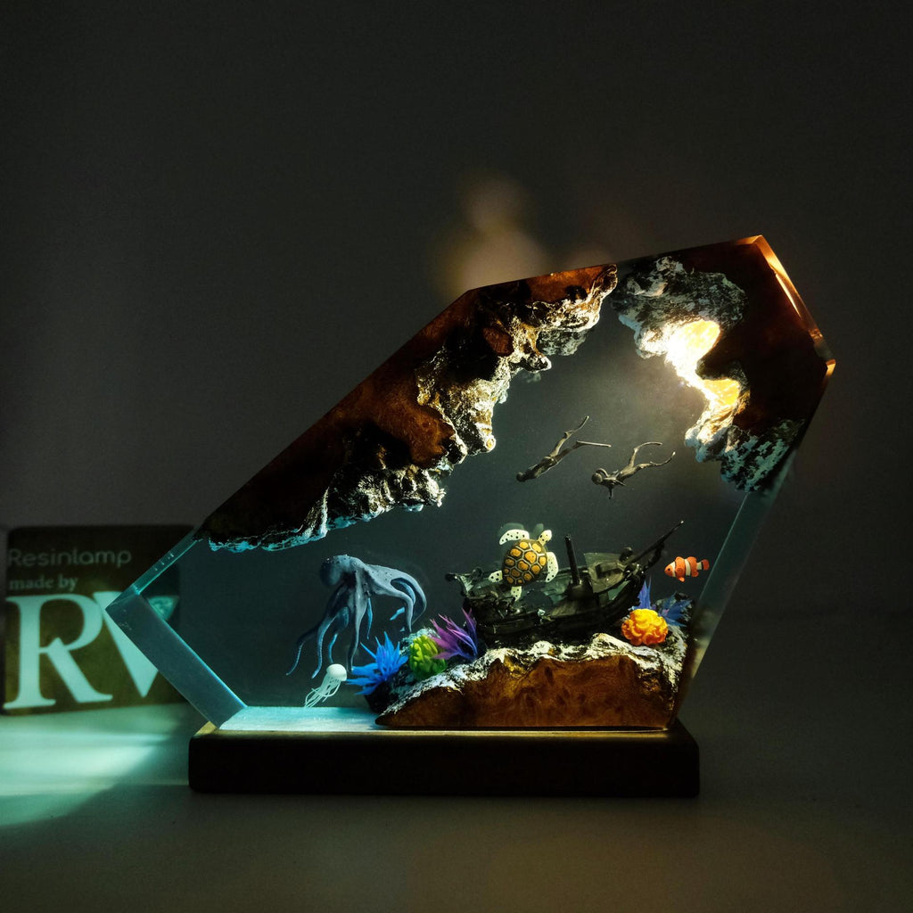 Octopus Lamp — an octopus cast in epoxy resin over a solid wood base, lit from underneath